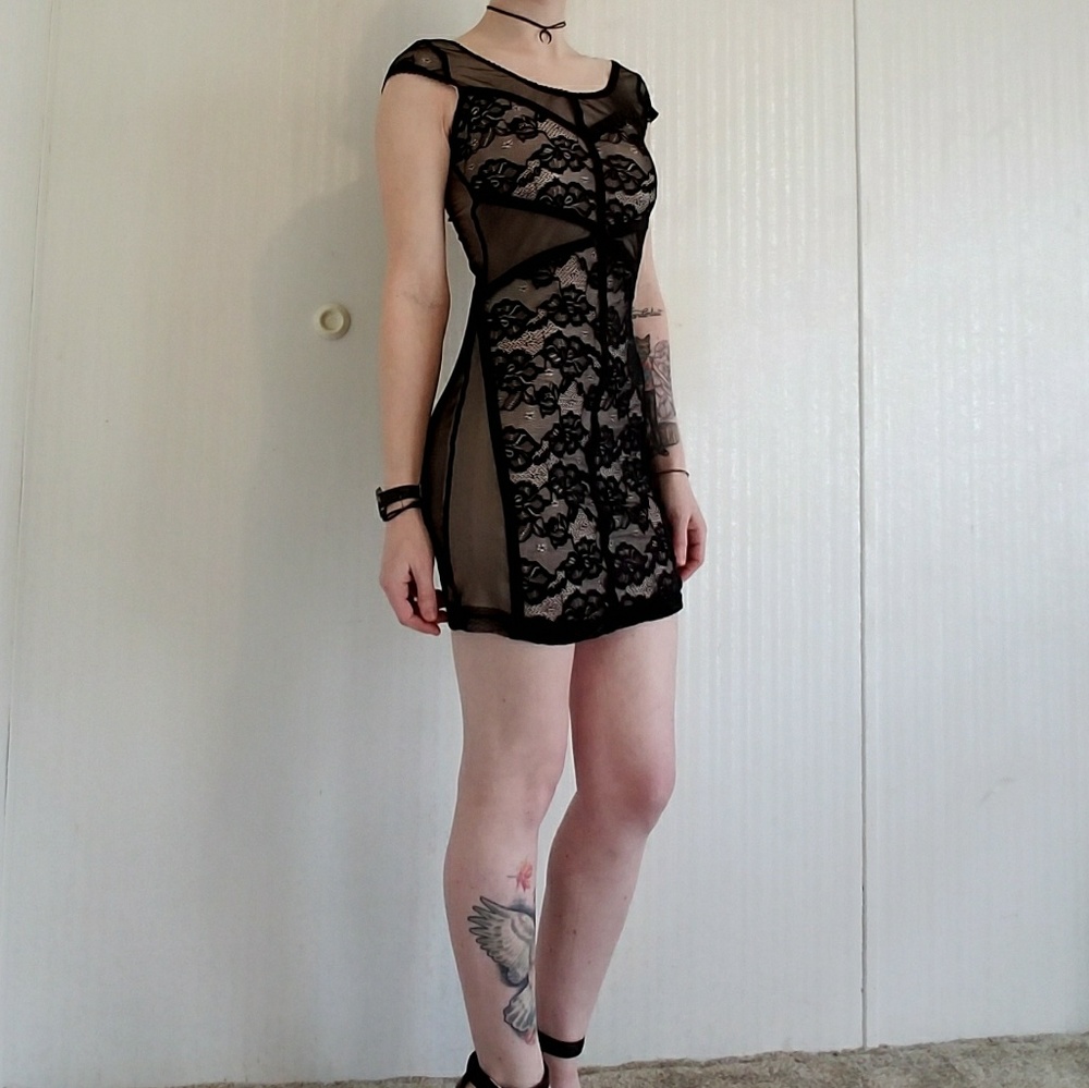 Curve hugging dress.